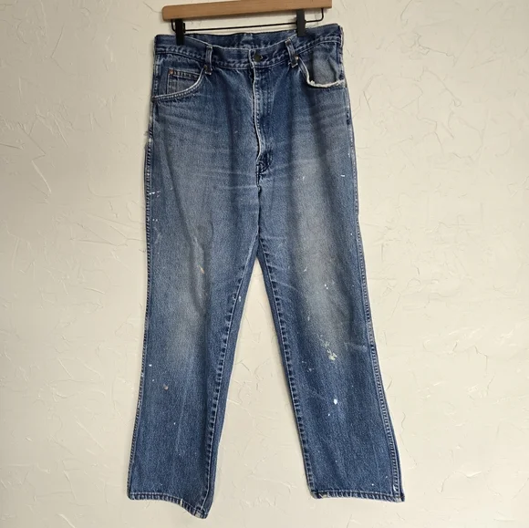 Vintage Levi's 557 Cowboy Distressed Jeans